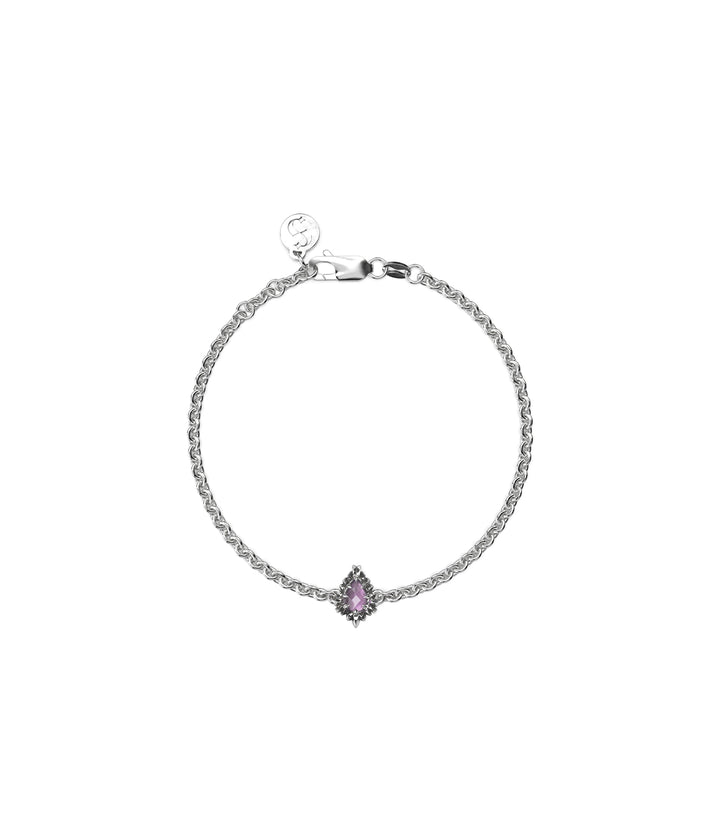 Sterling silver bracelet with marquise-cut amethyst and serrated bezel setting.
