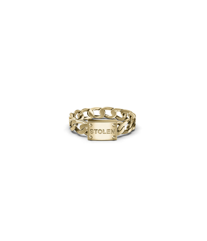 Front view of 18k gold-plated Curb Ring on white background with engraved STOLEN plaque.