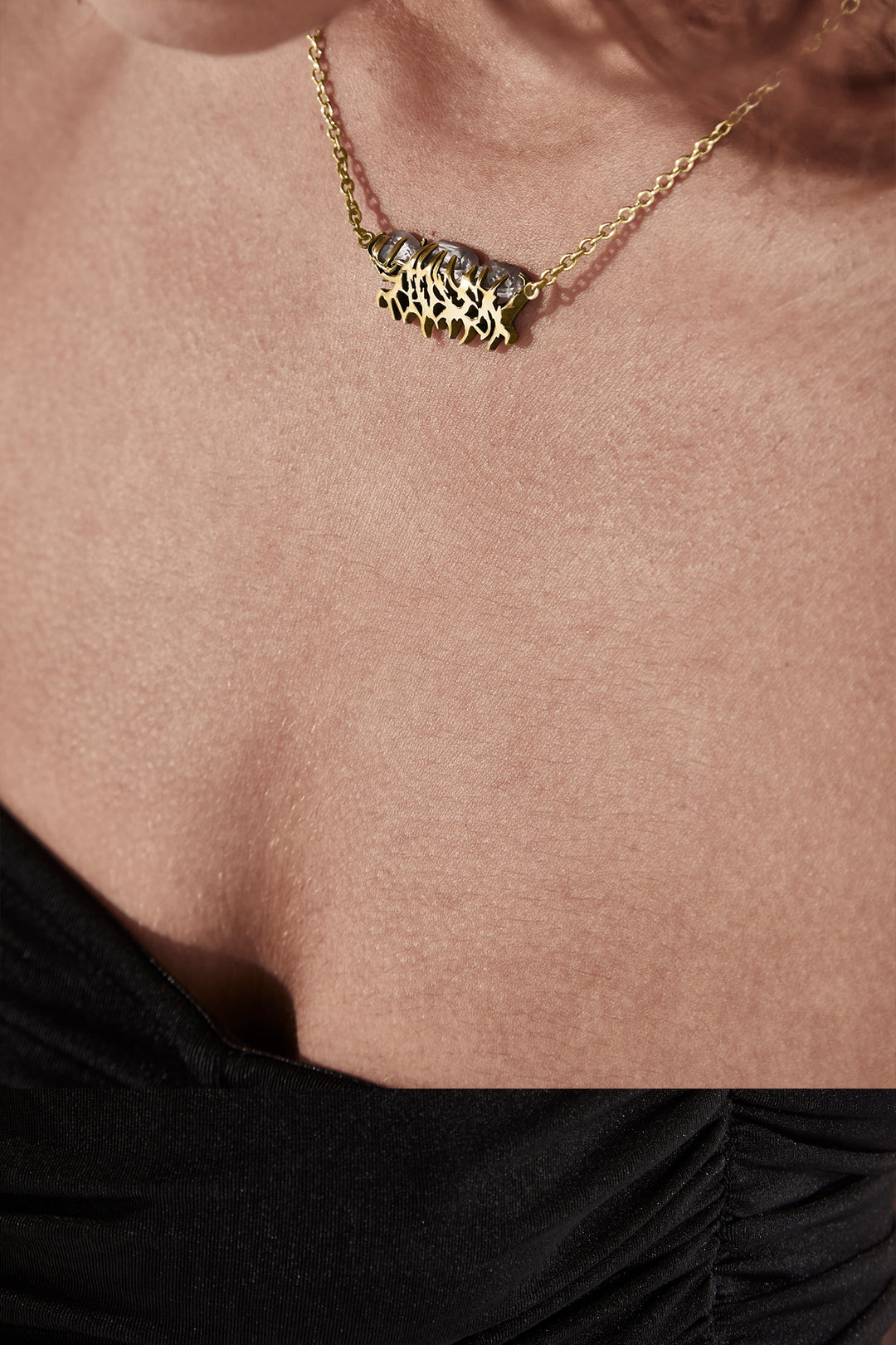 DELICATE DISTORTION NECKLACE - GOLD PLATED