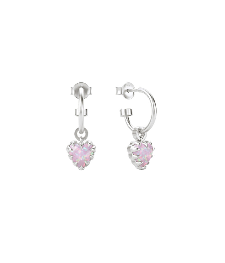 Love Claw Anchor Earrings with heart-shaped Pink Bello Opals suspended from polished sterling silver hoops on white background