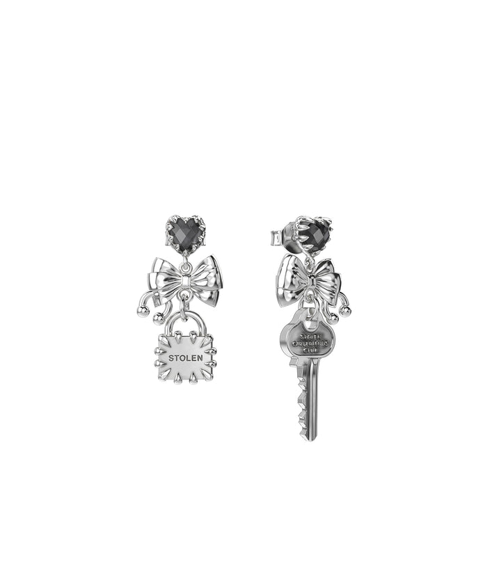 Sterling silver Love Locked Bow Earrings on white background showing mismatched padlock and key charms.