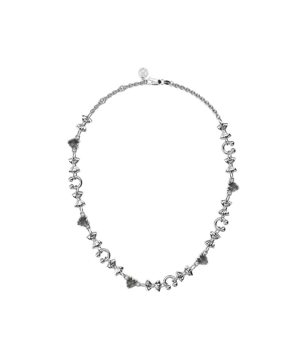 Sterling silver necklace with bows, heart-shaped gems and pierced accents on white background