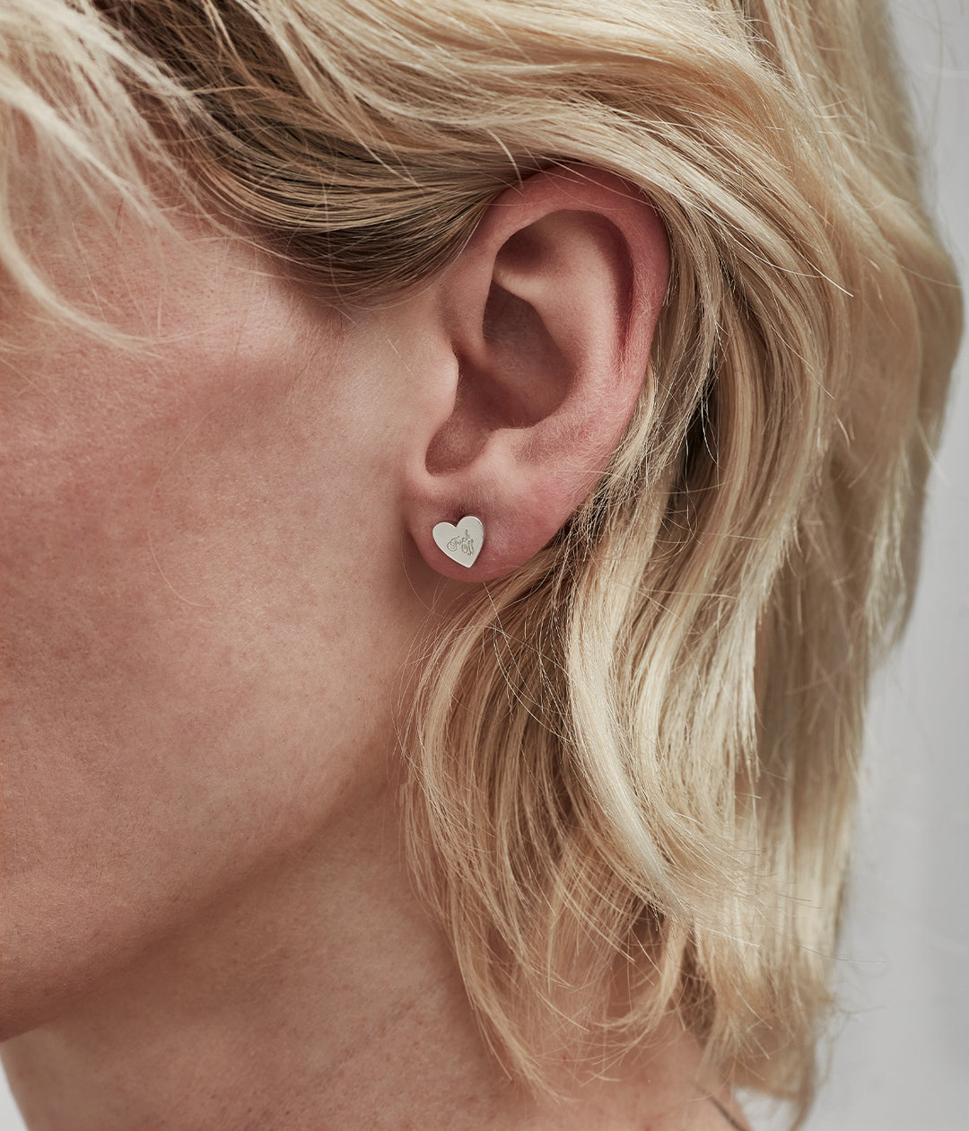 WARM WELCOME HEART STUDS