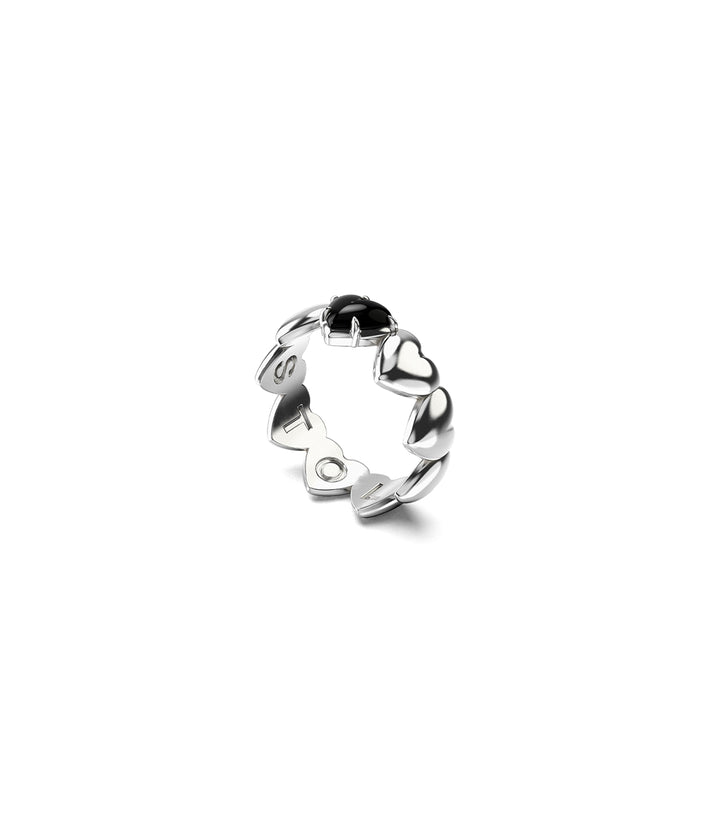 Three-quarter angled view of Band of Hearts Ring in sterling silver, showing heart-shaped band and onyx setting.