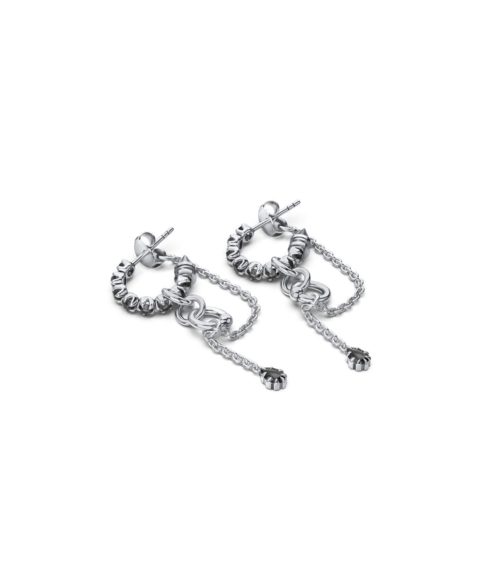 Close-up of Metasoma Eternity Hoops showing faceted Clear Quartz gemstones, polished silver links and articulated chain details.