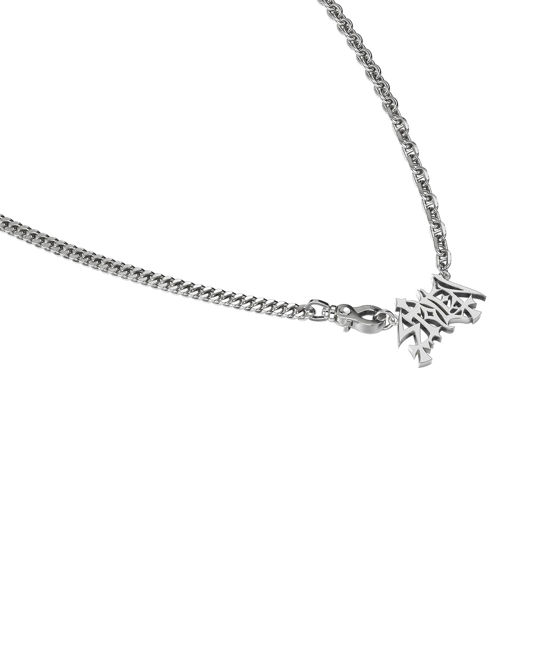 Close-up of sculptural STOLEN pendant and polished links.