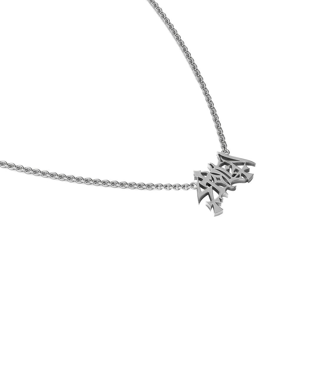 Close-up of Stolen Mayhem sterling silver pendant showing sculptural type treatment.