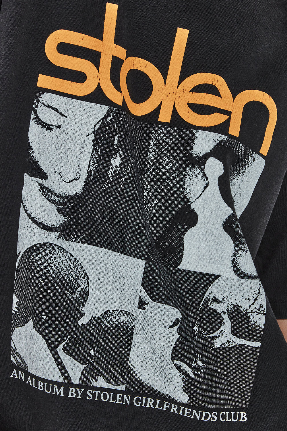 Black t-shirt with graphic design and 'stolen' text in orange, featuring an album by Stolen Girlfriends Club.