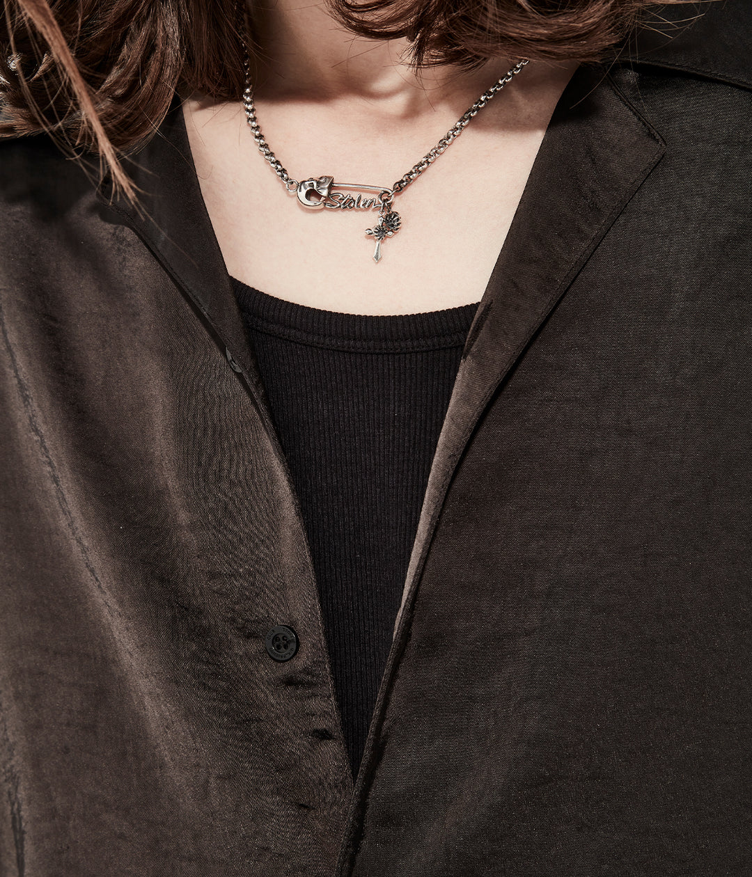 Sterling silver Gothic Pin Necklace styled on male model to show pendant scale and chain placement.