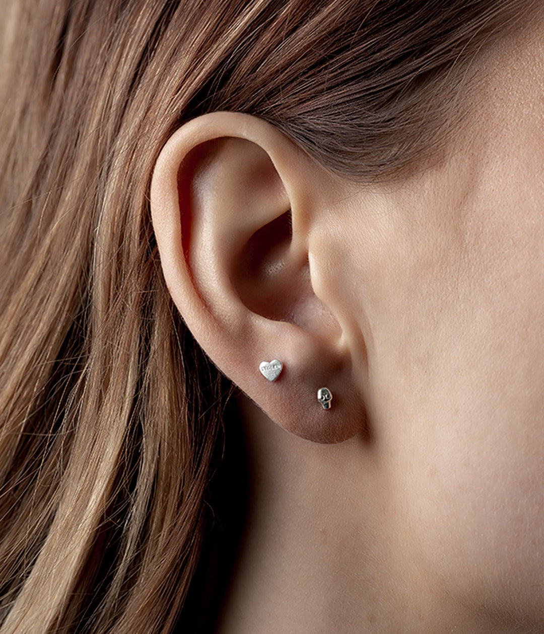TINY STOLEN SKULL EARRINGS