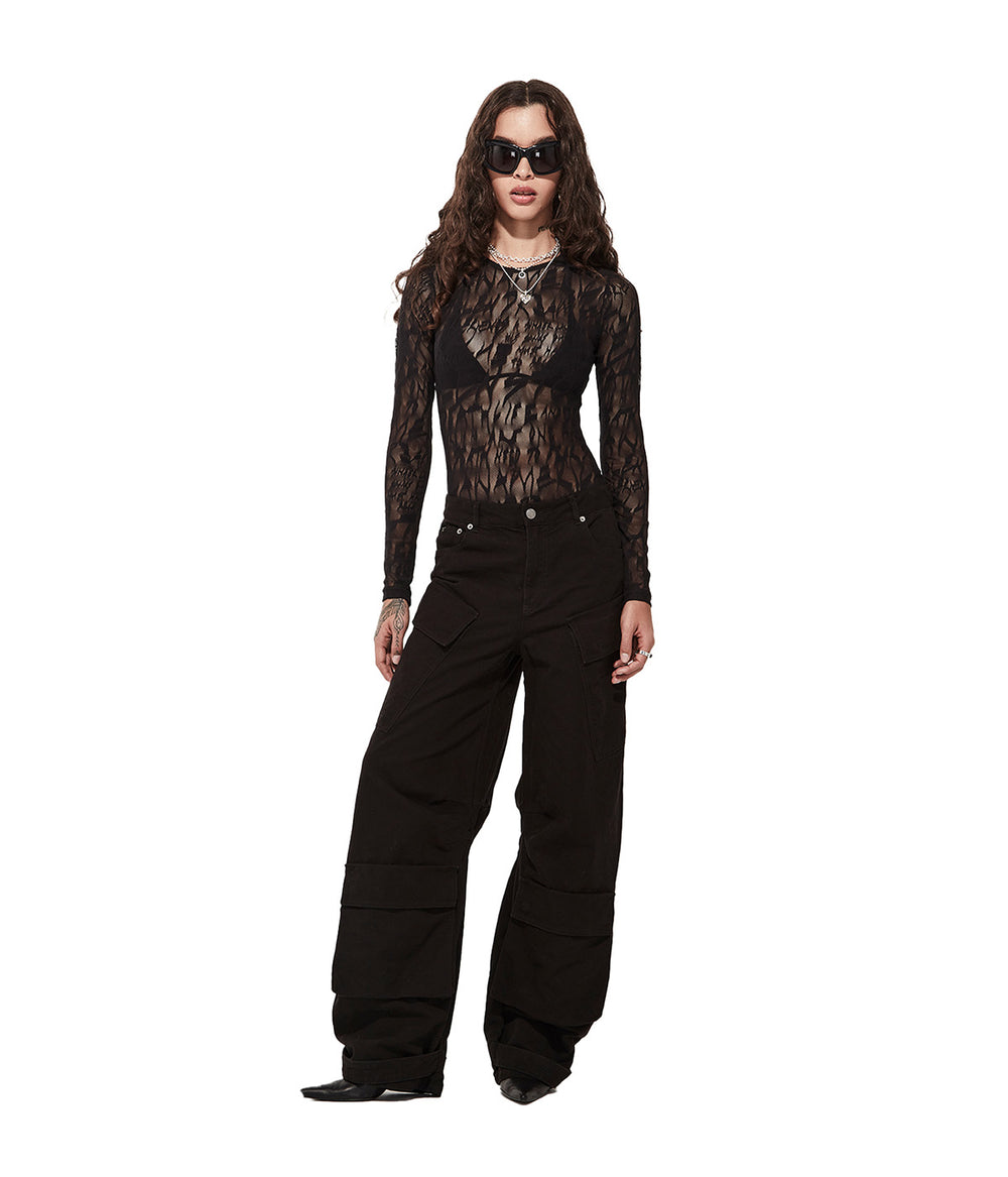 Stolen Girlfriends Club - Women's Black Long Sleeve Lace Bodysuit on model - front view  against white background
