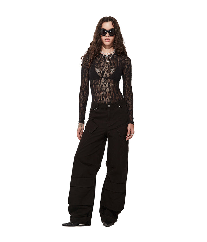 Stolen Girlfriends Club - Women's Black Long Sleeve Lace Bodysuit on model - front view  against white background