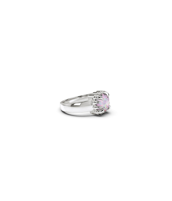 Stolen Girlfriends Club Baby Claw Ring with iridescent Pink Bello Opal encased in polished sterling silver claws. 3/4 view to show deeper details